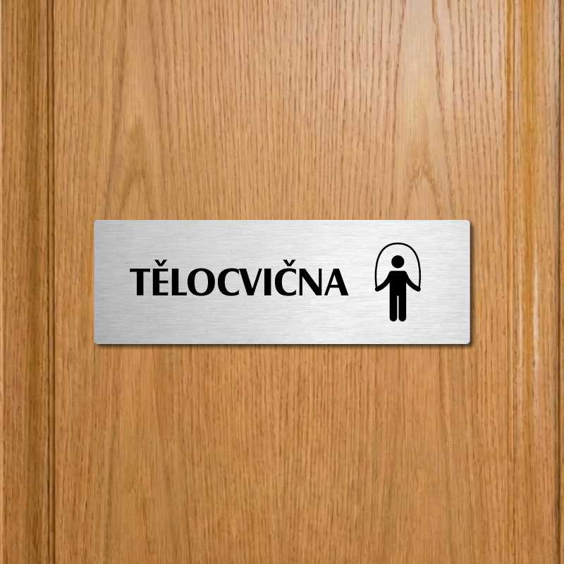 Tělocvična, 240x79mm, zlatá popiska s imitacemi šroubků